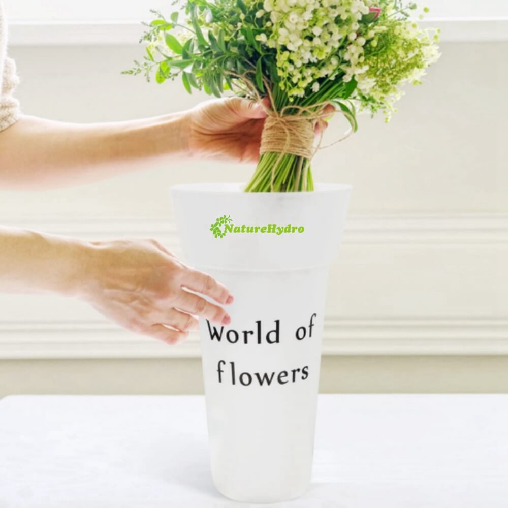 white flower arrangement bucket